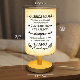 Calibron table lamp USB port for convenient device charging at bedside or desk.