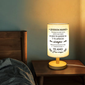 Calibron table lamp wood base detail adds natural warmth to any room.
