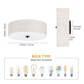 CALOKES beige fabric drum shade highlights refined design in a bedroom.