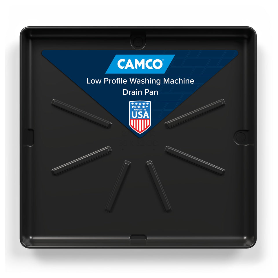 Camco low-profile drain pan under washer showing compact footprint and protection from leaks