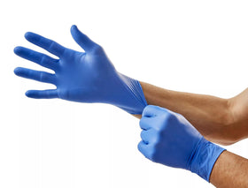 Cardinal Health Flexal Touch gloves show textured fingertips for secure grip during procedures.