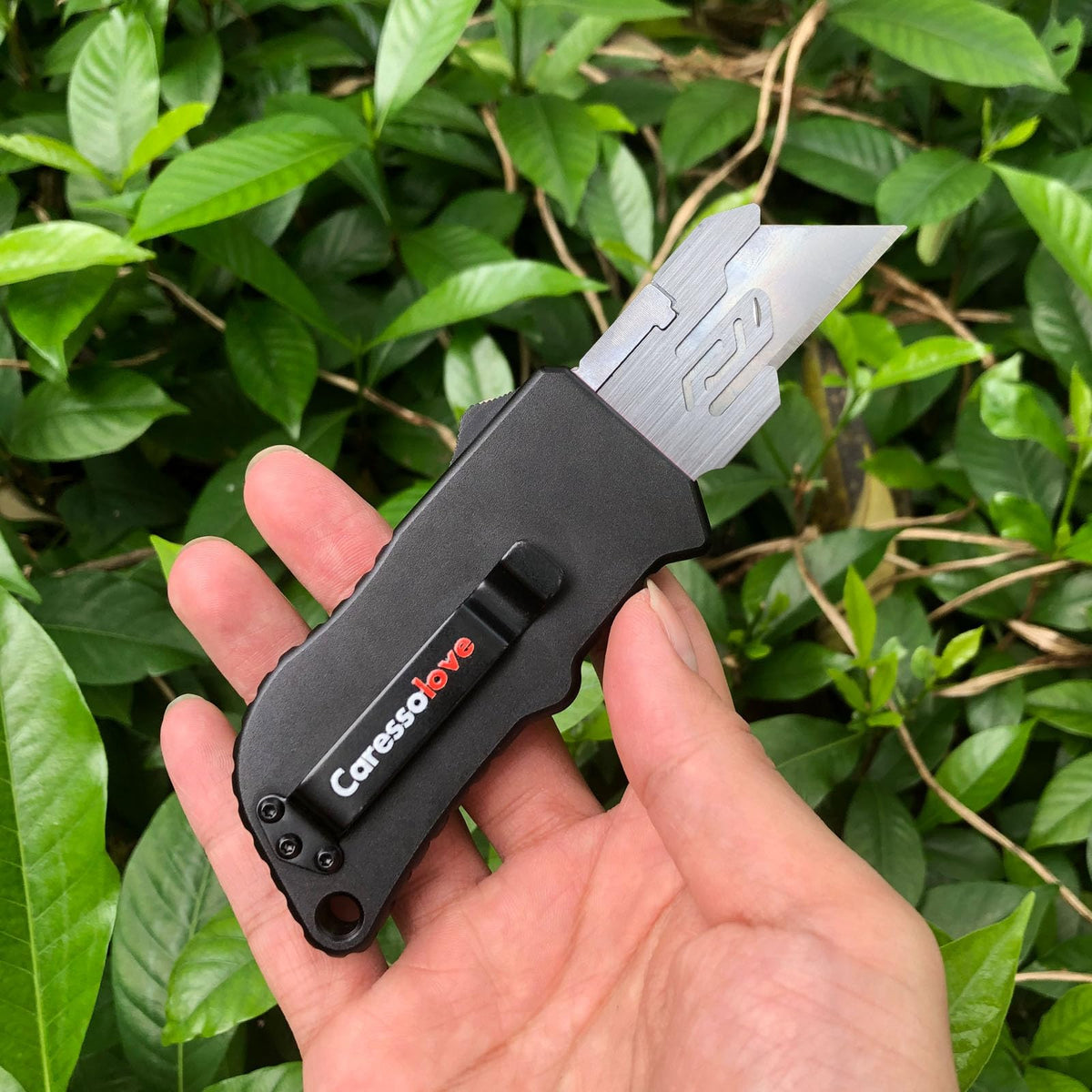 Caressolove safety slider retracts blade for safer operation when idle.