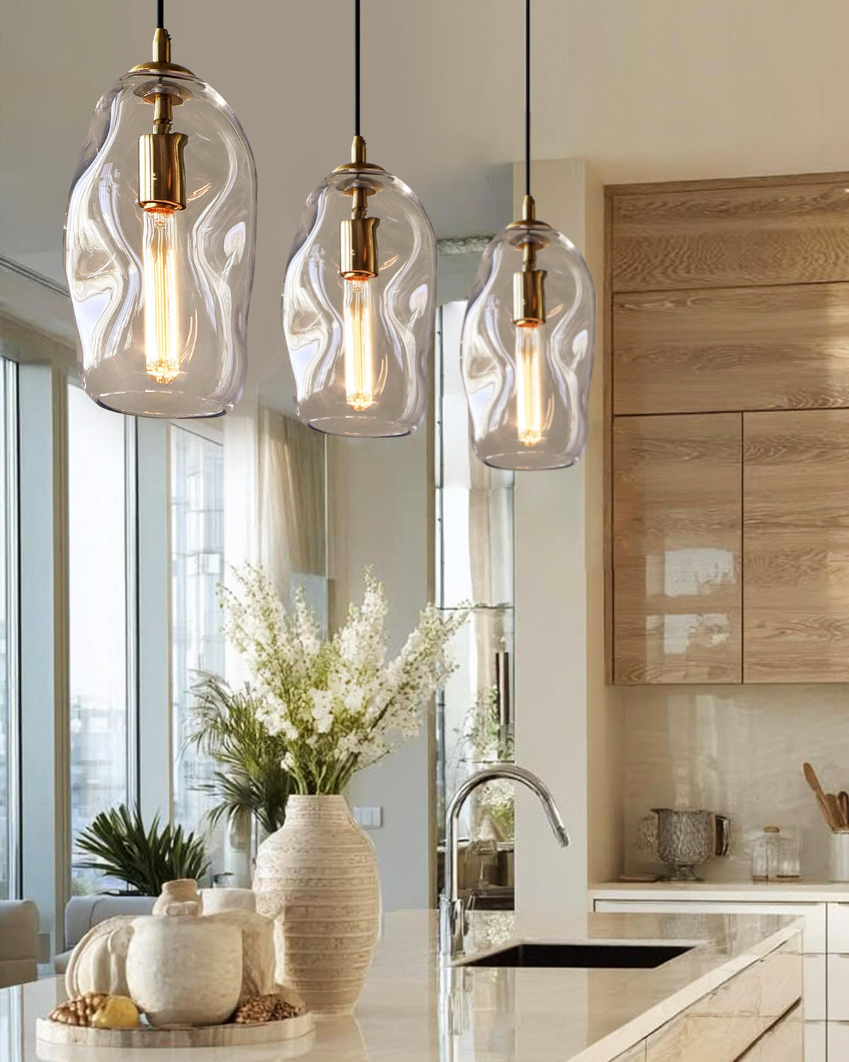 CASAMOTION gold fixture over dining table creates warm ambience.