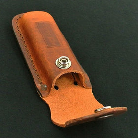 Case Trapper Sheath stamp detail, shows Trapper logo and durable leather.