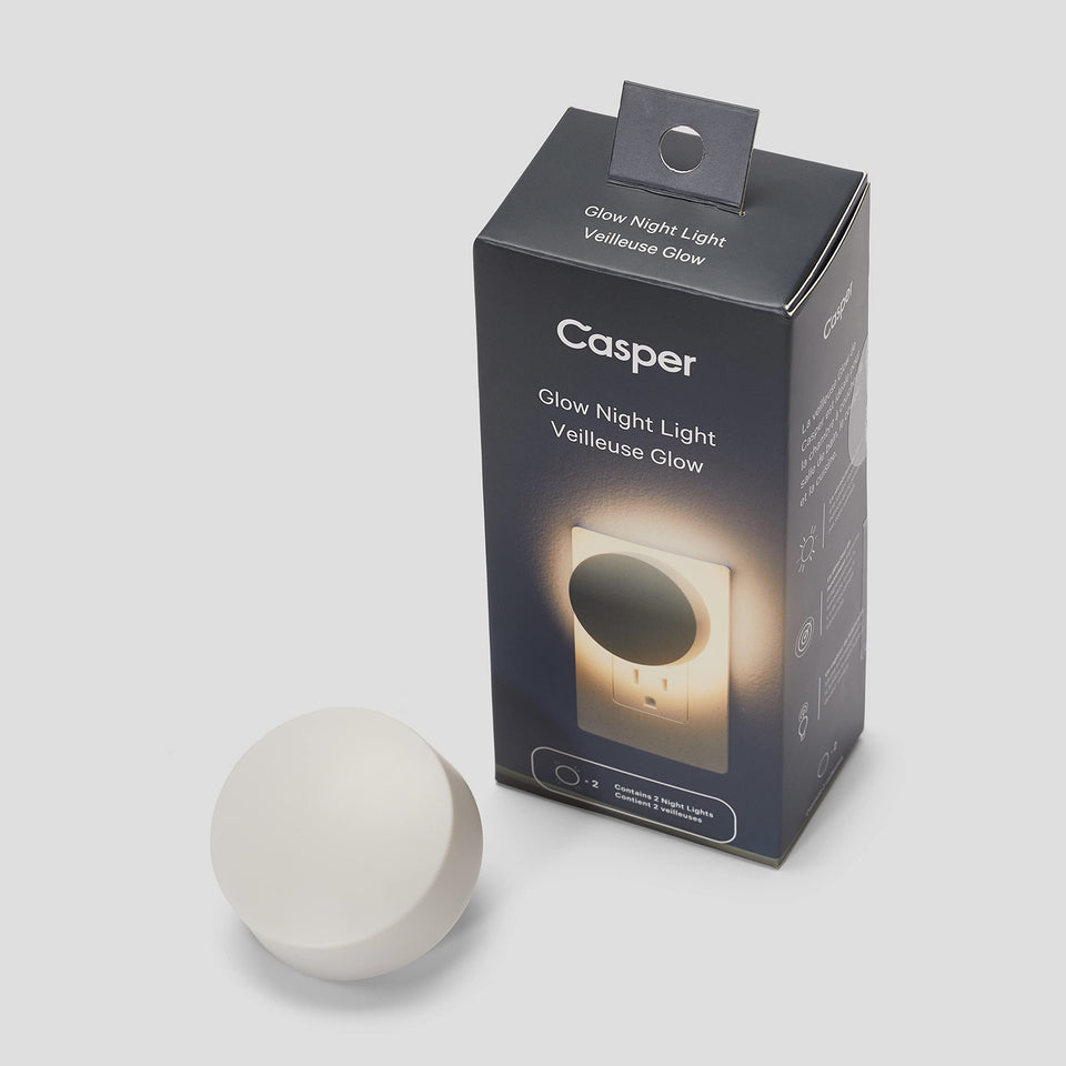 Casper Glow Night Light on nightstand softly guides midnight steps.