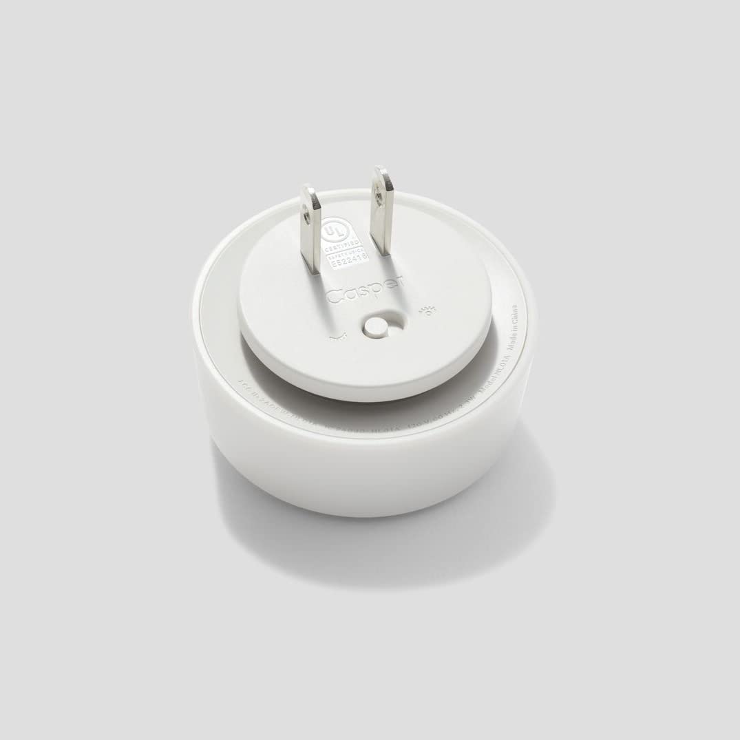 Casper Sleep Glow Night Light darkness-sensing illuminates bedrooms with soft ambient light.