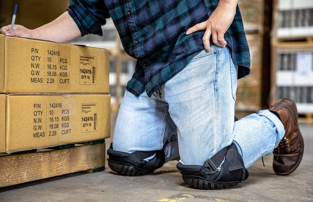 CE' CERDR knee pads on flooring task shielding knees on hard surfaces during installation.