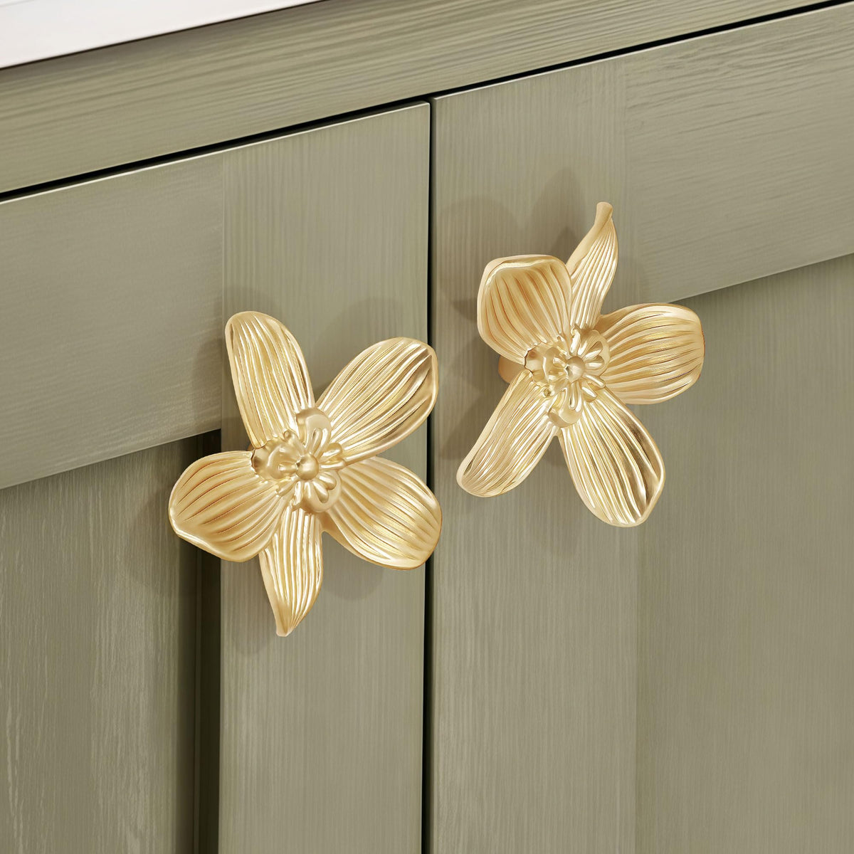 CEYMIO brushed gold flower knob on a kitchen cabinet for vintage elegance