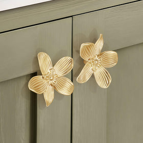 CEYMIO brushed gold flower knob on a kitchen cabinet for vintage elegance