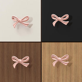 CEYMIO bow-knob on a nursery chest complements bathrooms and closets alike