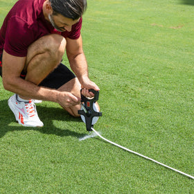 Champion Sports open reel measuring tape extended to 400 feet for long jump and field layouts
