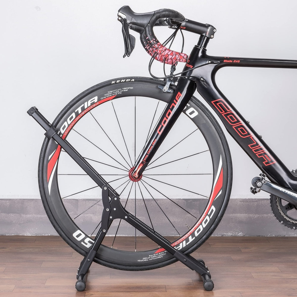 CHEPARK Bike Floor Stand loading a bike onto the tray with no lifting.