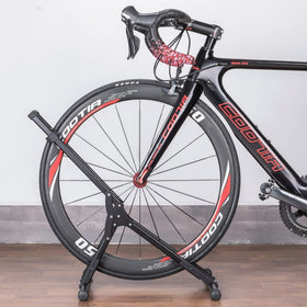 CHEPARK Bike Floor Stand loading a bike onto the tray with no lifting.