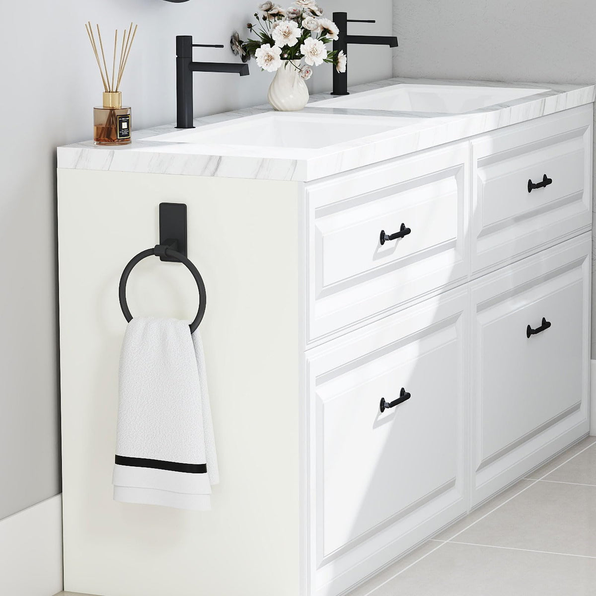 CHJgroup towel ring offers a no-drill adhesive option for light bathrooms.