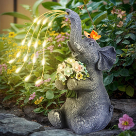 ChlinHuoho solar garden elephant figurine with gentle LED glow for outdoor ambience.