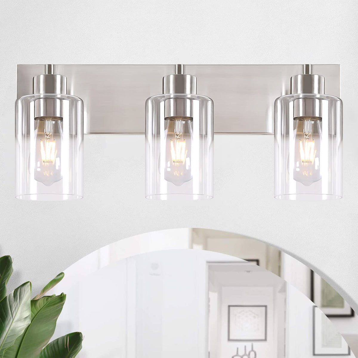 Chosenior 3-light vanity light with brushed nickel finish and clear glass shade brightens bathrooms.
