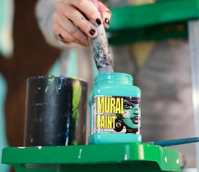 Chroma Mural Paint pots closeup showing vibrant pigments for outdoor projects