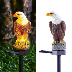 CHUANGFENG Eagle figurine solar stake light glows for outdoor garden illumination.