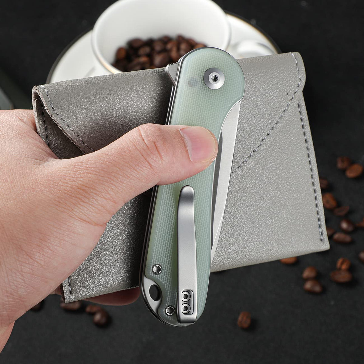 CIVIVI Elementum II flipper action with ceramic ball bearing for smooth deployment.