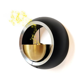 Cizenal shopkeepers bell on doorframe emitting a gentle brass chime to welcome customers.