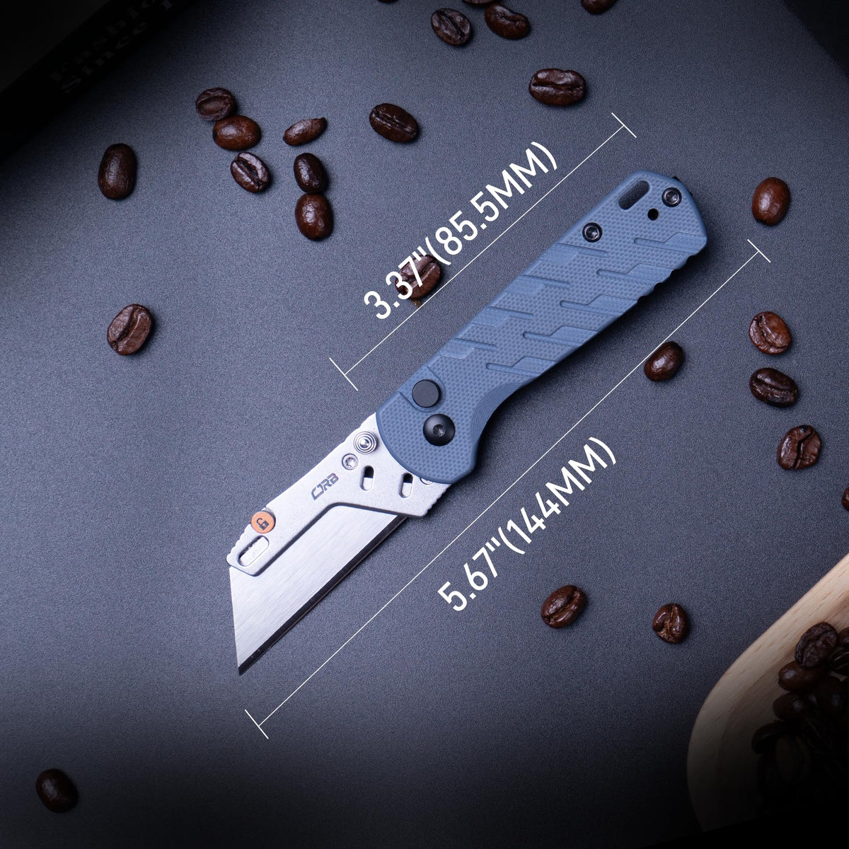 CJRB Boxer knife with pocket clip and lanyard hole for quick access.