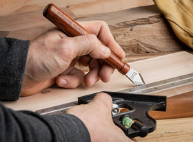 Clarke Brothers marking knife in sheath for safe transport.
