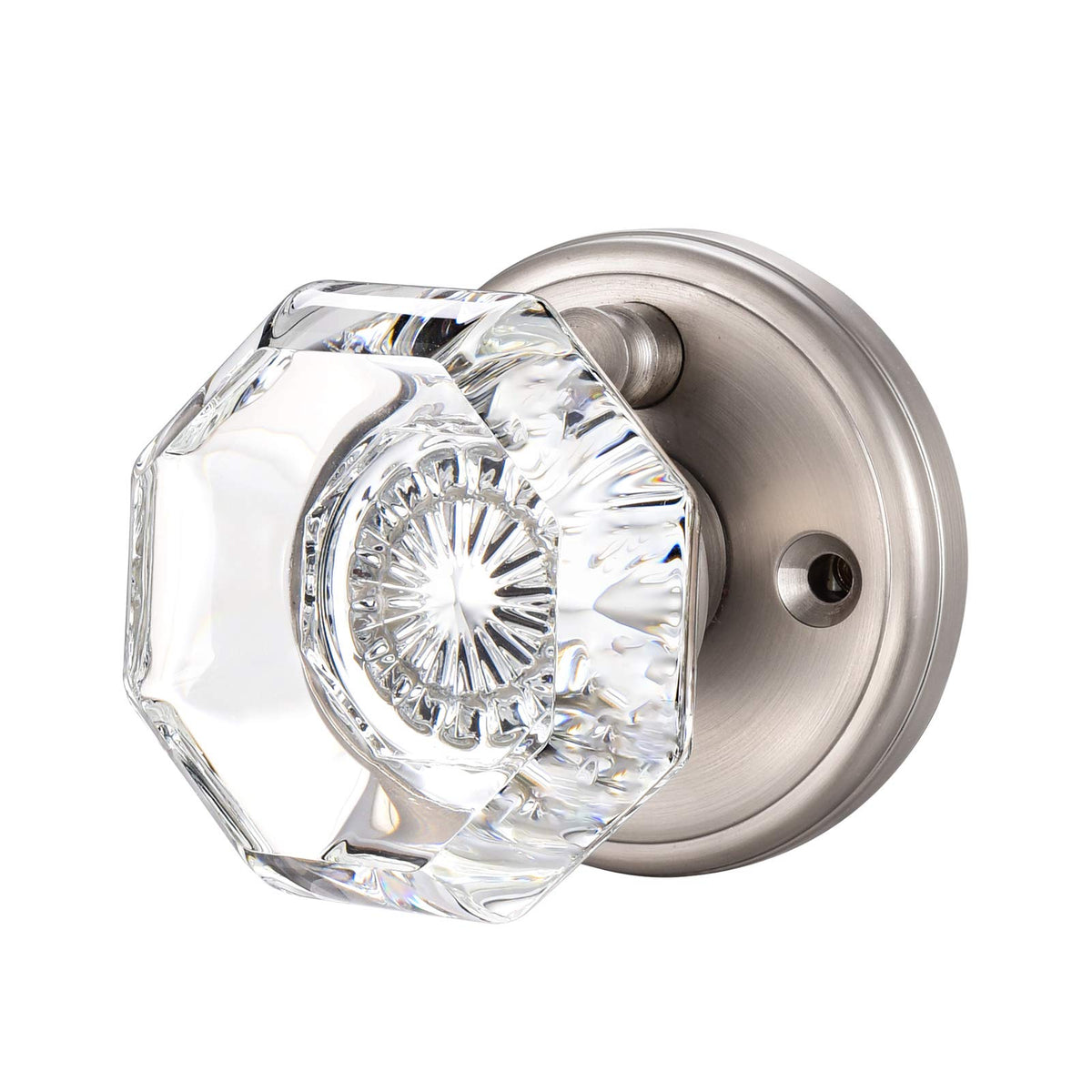 Close-up of CLCTK crystal glass knob in satin nickel for modern interior aesthetics