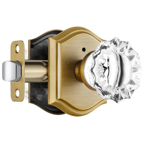 CLCTK glass door knob with privacy lock on antique brass adds secure style to interior doors