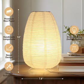 CMHSYTKE rice paper lamp in bedroom emits cozy ambience.