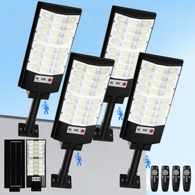 CNOIJUTS solar street light 4-pack during installation highlighting quick setup and coverage
