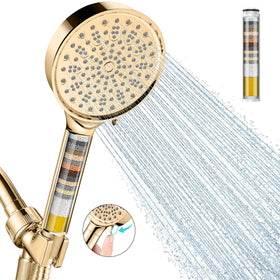 Cobbe filtered shower head panel in Egyptian Gold delivering high-pressure spray