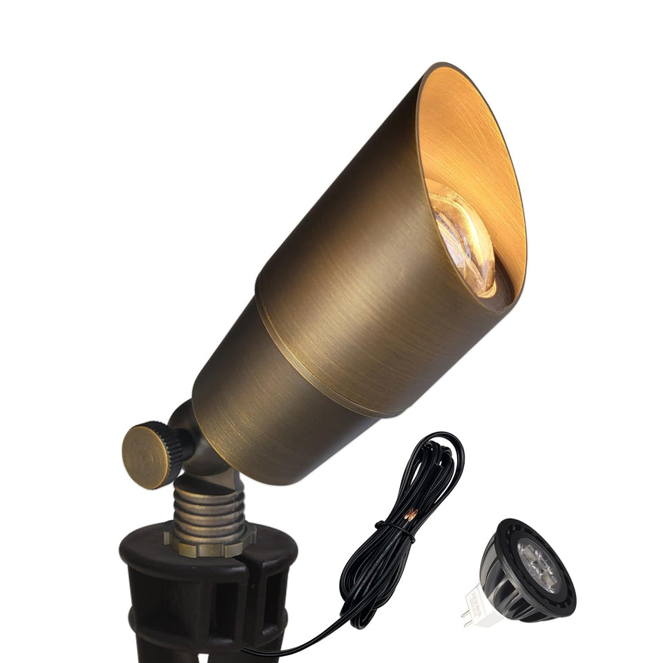 COLOER brass low-voltage spotlight exterior in landscape setting