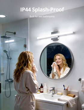 Installed Combuh vanity light mounted on wall above a mirror.