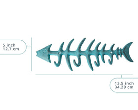 Wall-mounted Comfify Fish Bones Towel Rack in teal adds vintage flair.