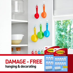 Removing Command strips to minimize wall damage after use