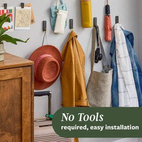 Command Latte hanging kitchen utensils for convenient access.