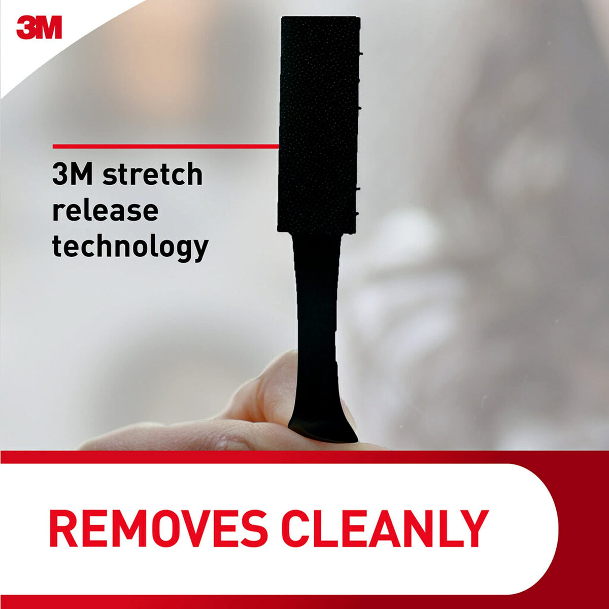 Black adhesive blends with walls while holding frames firmly.