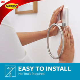 Command strips packaging demonstrates damage-free bathroom installation.