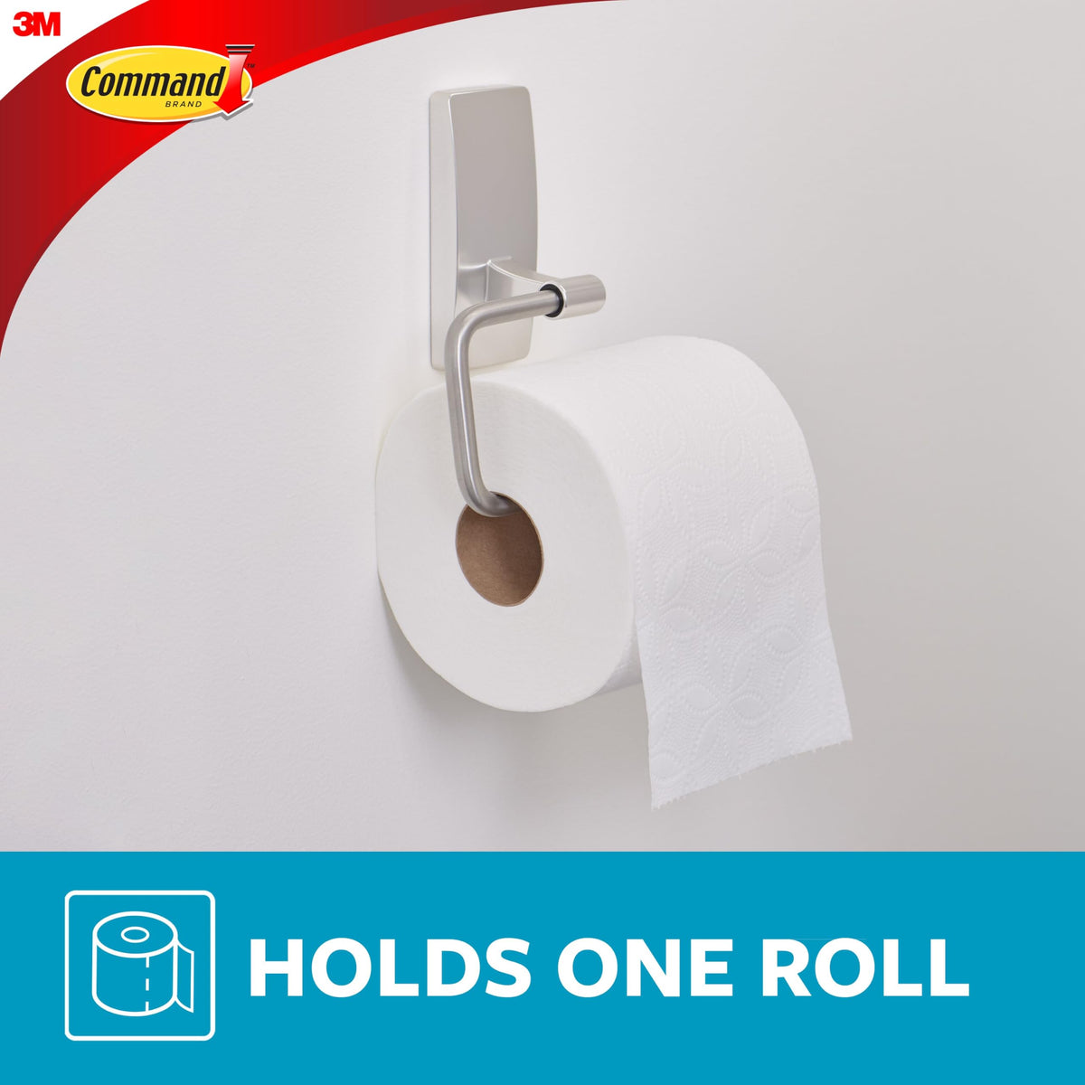 Command toilet paper holder mounted on tile highlights durability in moisture-prone areas.