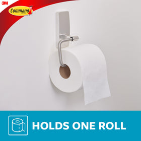 Command toilet paper holder mounted on tile highlights durability in moisture-prone areas.