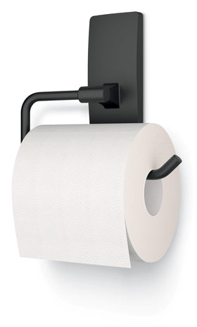 Command toilet paper holder on painted wood surface shows surface compatibility.
