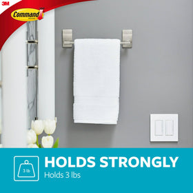 Command Towel Bar adheres to glass and mirror surfaces without damage.