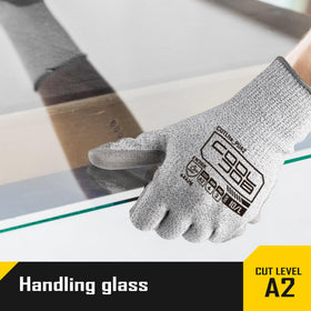 COOLJOB gloves on hand during wood carving for precise control