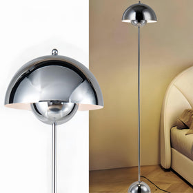 COSYLUX chrome floor lamp with a dome shade provides indirect living room lighting.