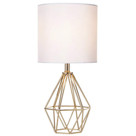 Cotulin gold modern hollow base lamp on a nightstand for stylish ambience