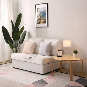 Cotulin white fabric shade table lamp diffusing warm light