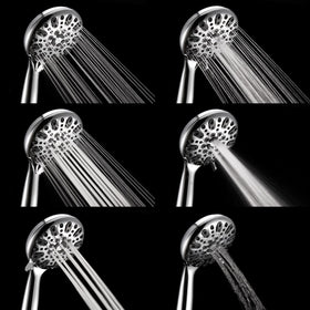 Couradric chrome shower head with brass bracket for precise aiming.
