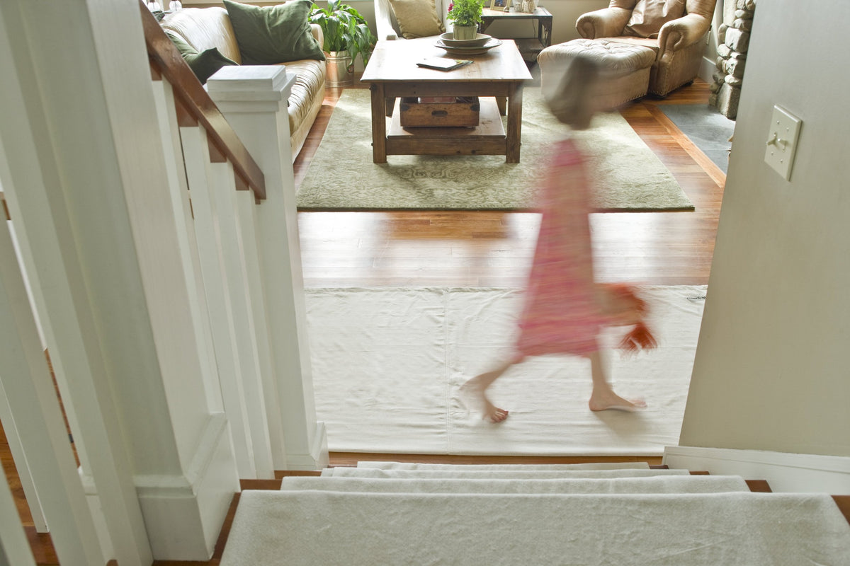 CoverGrip drop cloth on stairs showing secure placement