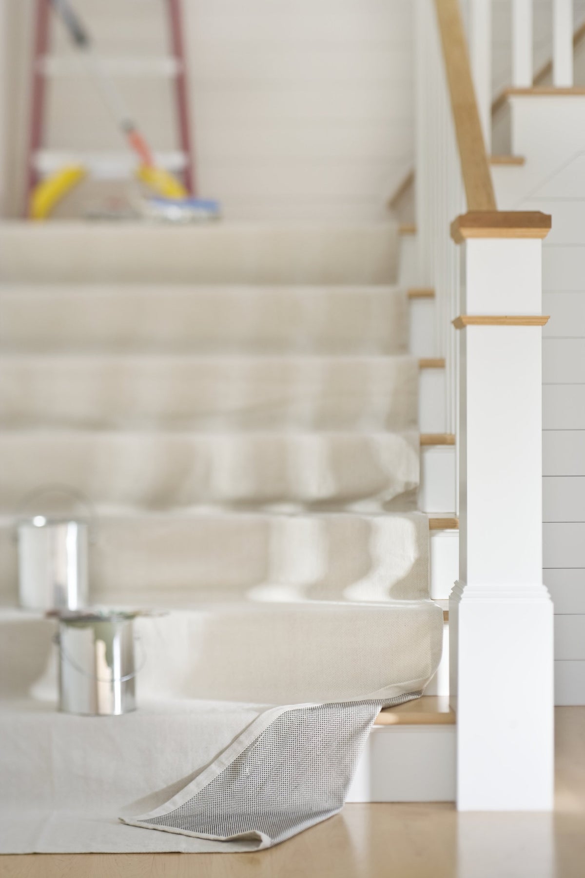 Cloth folded along dotted lines to fit stairs and corners