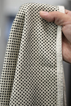 CoverGrip drop cloth folded along dotted lines fits stairs and corners